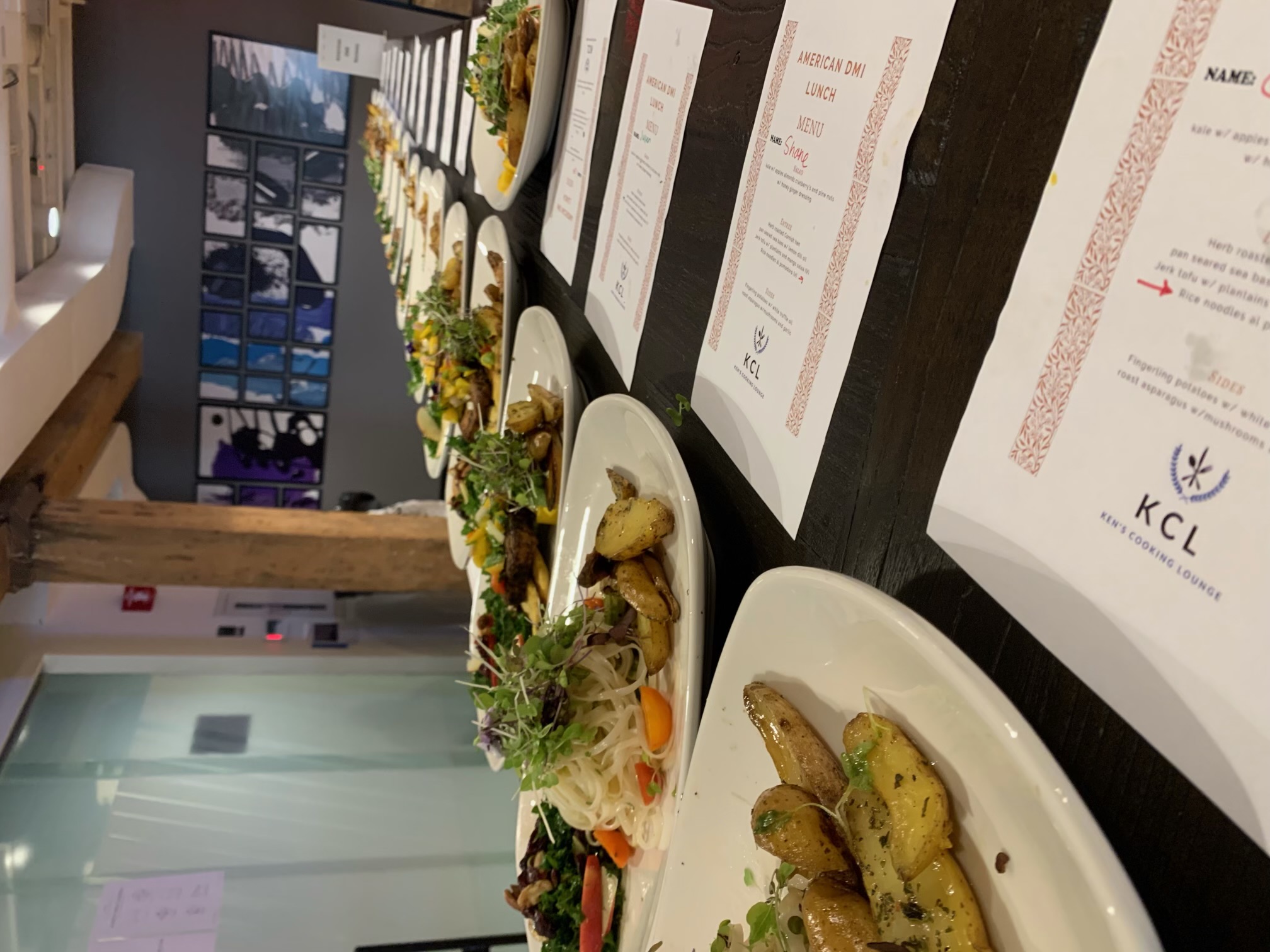 Rows of plated dinners prepared by Ken's Cooking Lounge
